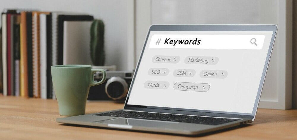 A laptop showing the word "keywords"