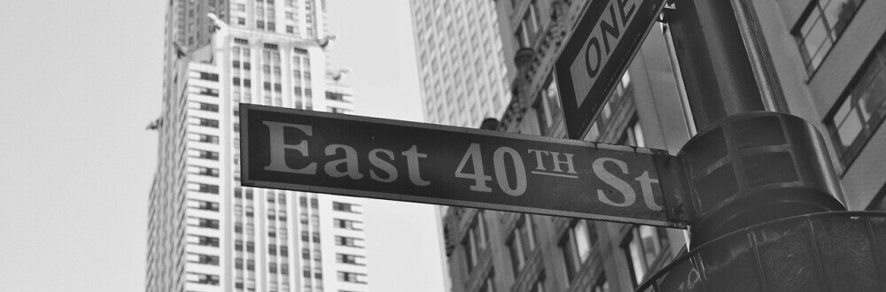 a street sign pointing the way